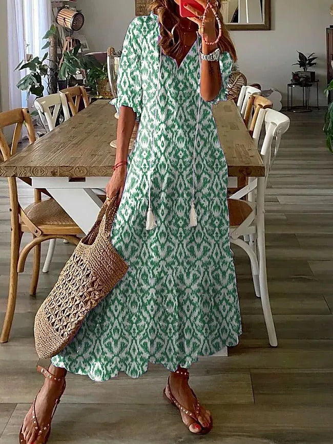 Bohemian V-Neck Floral Maxi Dress with Tassel Accents