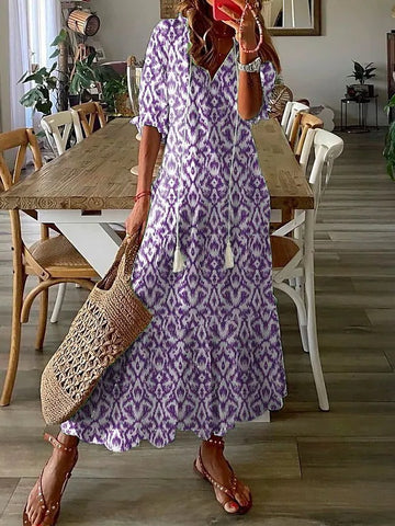 Bohemian V-Neck Floral Maxi Dress with Tassel Accents