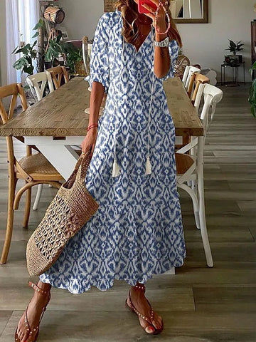 Bohemian V-Neck Floral Maxi Dress with Tassel Accents